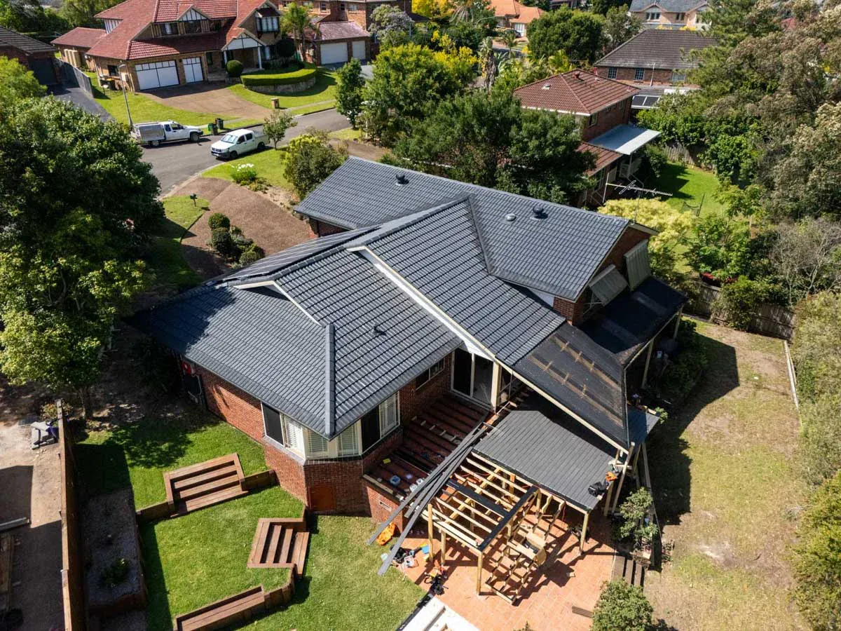 Roof painting finish across a tiled roof